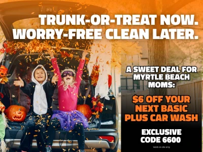 Car ready for Trunk-or-Treat with kids in costumes throwing leaves. Text reads: "Trunk-or-Treat now. Worry-free clean later. A sweet deal for Myrtle Beach Moms: $6 off your next Basic Plus car wash. Exclusive code 6600 valid on-site only."