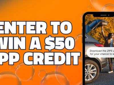 "Enter to Win a $50 App Credit" text next to a phone displaying a smiling woman next to her car. A notification on the phone reads "Download the ZIPS app for your chance to win."