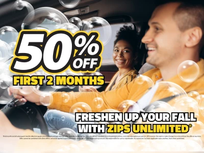 Woman looking at man smiling as he drives. Text reads "50% off First 2 Months. Freshen up your fall with ZIPS Unlimited®."
