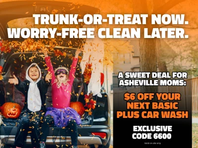 Car ready for Trunk-or-Treat with kids in costumes throwing leaves. Text reads: "Trunk-or-Treat now. Worry-free clean later. A sweet deal for Asheville Moms: $6 off your next Basic Plus car wash. Exclusive code 6600 valid on-site only."